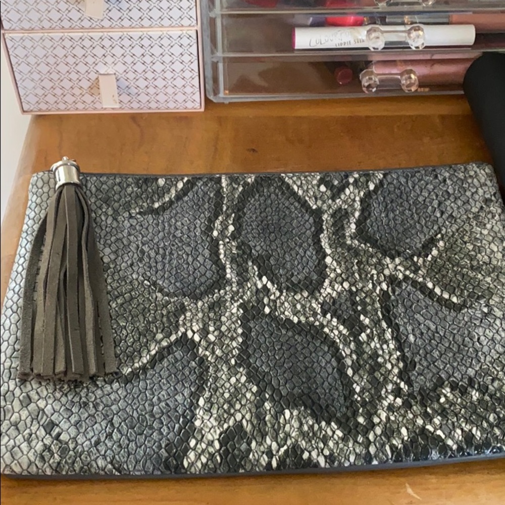 Snake print clutch